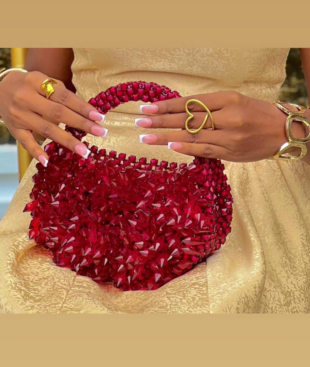 Xena Handwoven Spiked Statement Bag – African Artisan Fashion Accessory